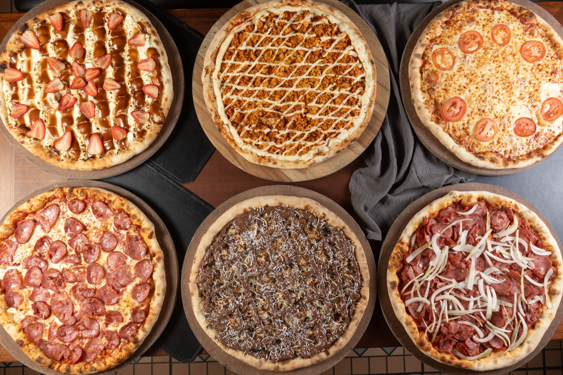 Variedade de pizzas da Numa